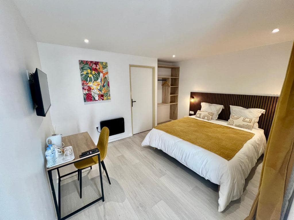 Chambre feuillage tropical · © L'Enclos du Volcan
