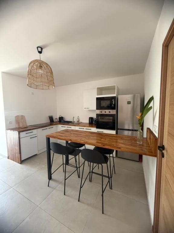Cuisine et coin repas ouverts · © Le Sounta